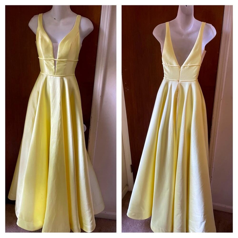 La femme plunge ballgown in pale yellow